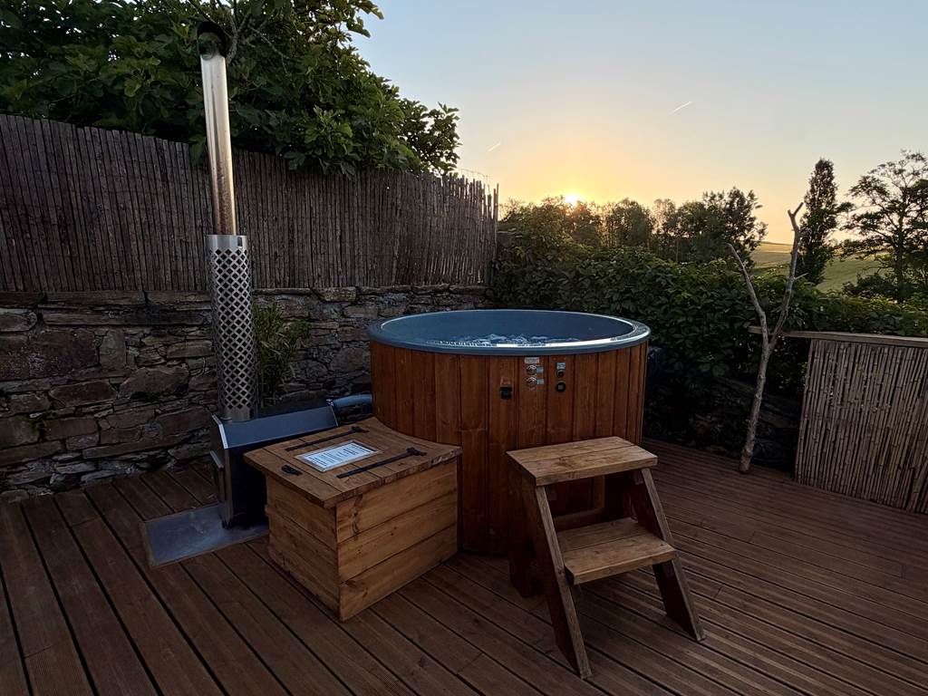 Jacuzzi face au lever du soleil