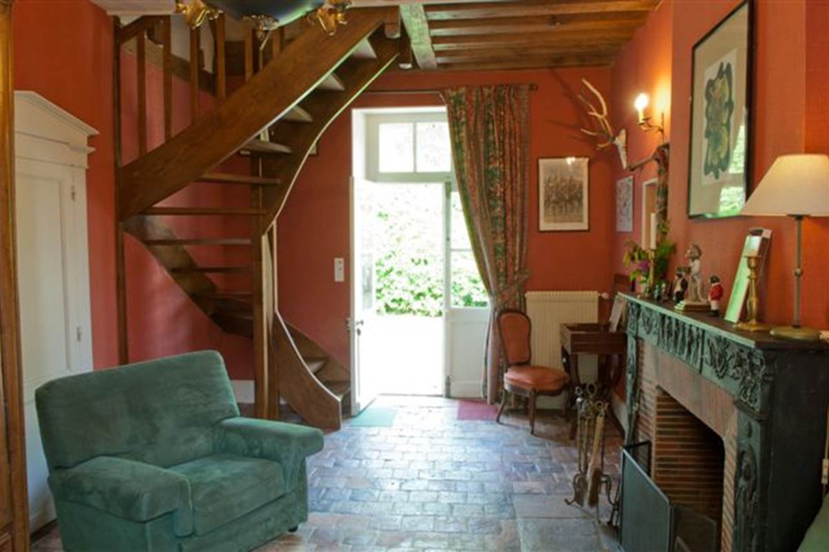 L'Annexe Le salon en rez de chaussée de la suite familiale