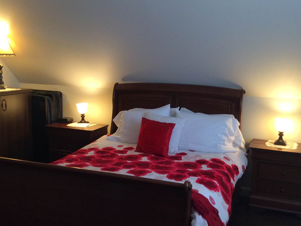Le lit de la chambre Charmante