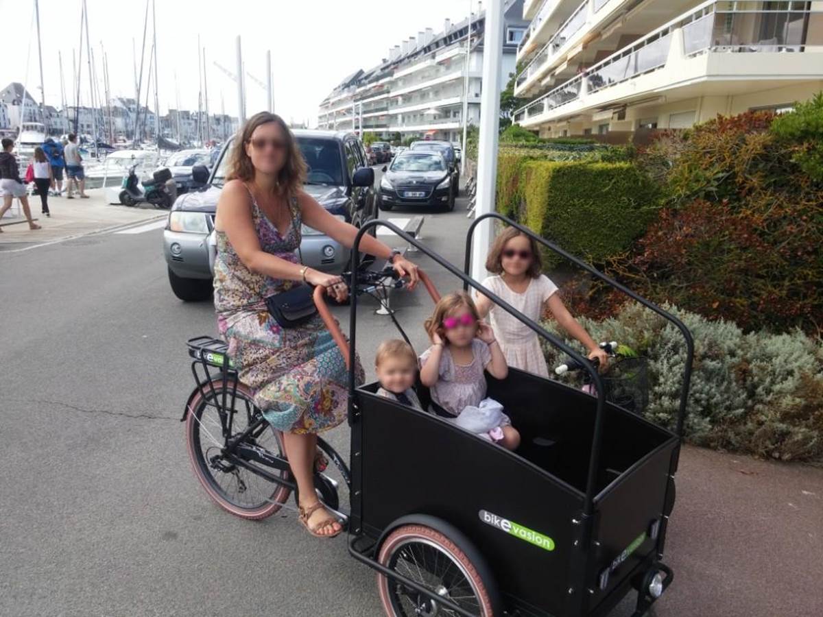 la Famille en triporteur pour la plus grande joie de toutes et tous