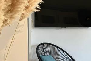 Chambre équipée d'une TV à écran plat pour vos moments de détente