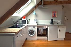 Salle à manger et cuisine équipée