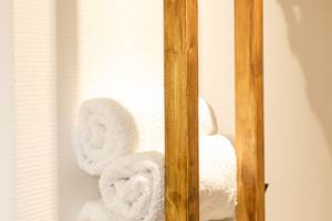 •	linge de bain fourni