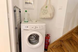 La machine à laver dans le séjour