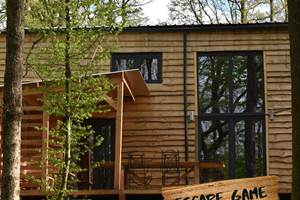 Cocon dans la forêt carré escape game