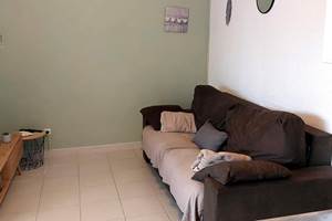 Salon avec canapé convertible