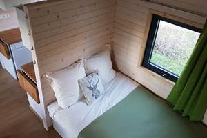 Cabane du Cerf, banquette salon en mode couchages