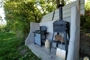 Espace plancha et four à pizza