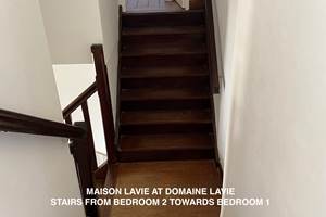 Maison Lavie staircase from Bedroom 2 towards Bedroom 1