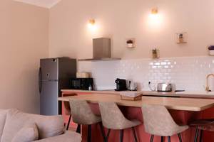 coin cuisine avec îlot Appartement La Bastide