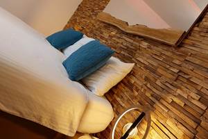 Chambre 1: Un lit double ou 2 lits simples + 1 lit bb.