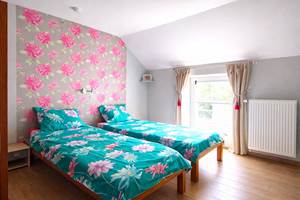 La chambre dite "Fleurie" et sa belle salle d'eau se trouvent au 1er étage