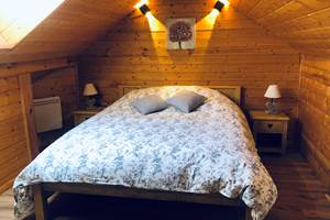 Chambre parentale avec un lit de 160x200