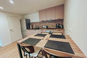 Coin repas maison location piscine Perros-Guirec
