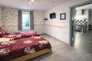 La chambre du rez de chaussée adaptée pour les PMR