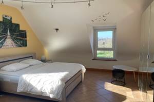 Grande chanbre avec 2 lits doubles