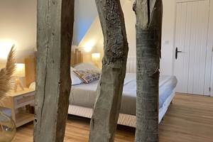 La chambre familiale 'La Grange' avec ses colombages celebre le bati ancien