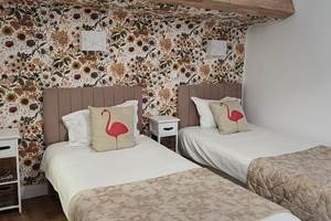 Chambre lits jumeaux au cœur de Biarritz