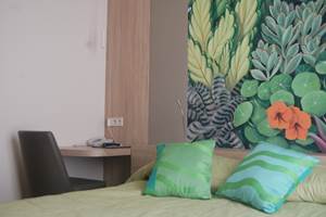 Chambre grand lit hôtel près du jardin du Luxemboug