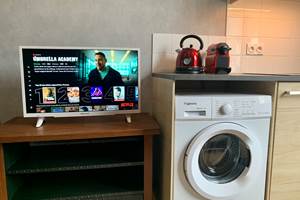 Appartement La Fabrique - La télévision Netflix et la machine à laver