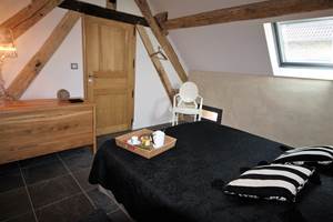 Chambre avec lit queen size Pichonna cottage de charme 5 étoiles