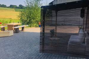 La terrasse avec la pergola