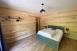 Suite parentale avec lit Queen Size donnant sur la terrasse