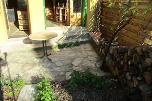 Vue jardin terrase et porte et pièce cuisine salon ++