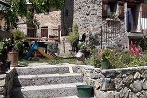 entrée et jardin en commun