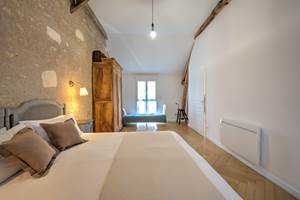 La chambre Grise au choix en lit double...