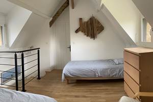 La chambre 'Les Marees' rappelle la presence proche de la mer