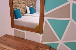 Chambre 1: Un lit double ou 2 lits simples + 1 lit bb.