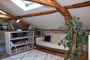 Espace détente maison d'hôtes bibliothèque