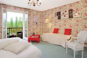 Chambre quadruple Coquelicot  Junior suite 26 avec lit gigogne et balcon - PMR