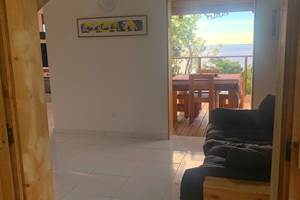 Séjour ouvert sur terrasse avec vue mer