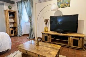 Coin salon avec TV HD