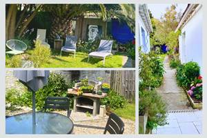 Maison Réthaise 2 – Jardin partagé et coin détente Un extérieur pensé pour la convivialité : transats sous les arbres, chemin arboré et coin barbecue pour des moments simples et chaleureux.