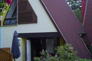 Pavillon Muscat en été avec sa terrasse de plain-pied