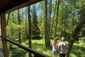 Vue depuis la terrasse couverte HY•Lødge Spa 6 personnes