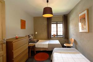 La chambre orange à l'Oustal